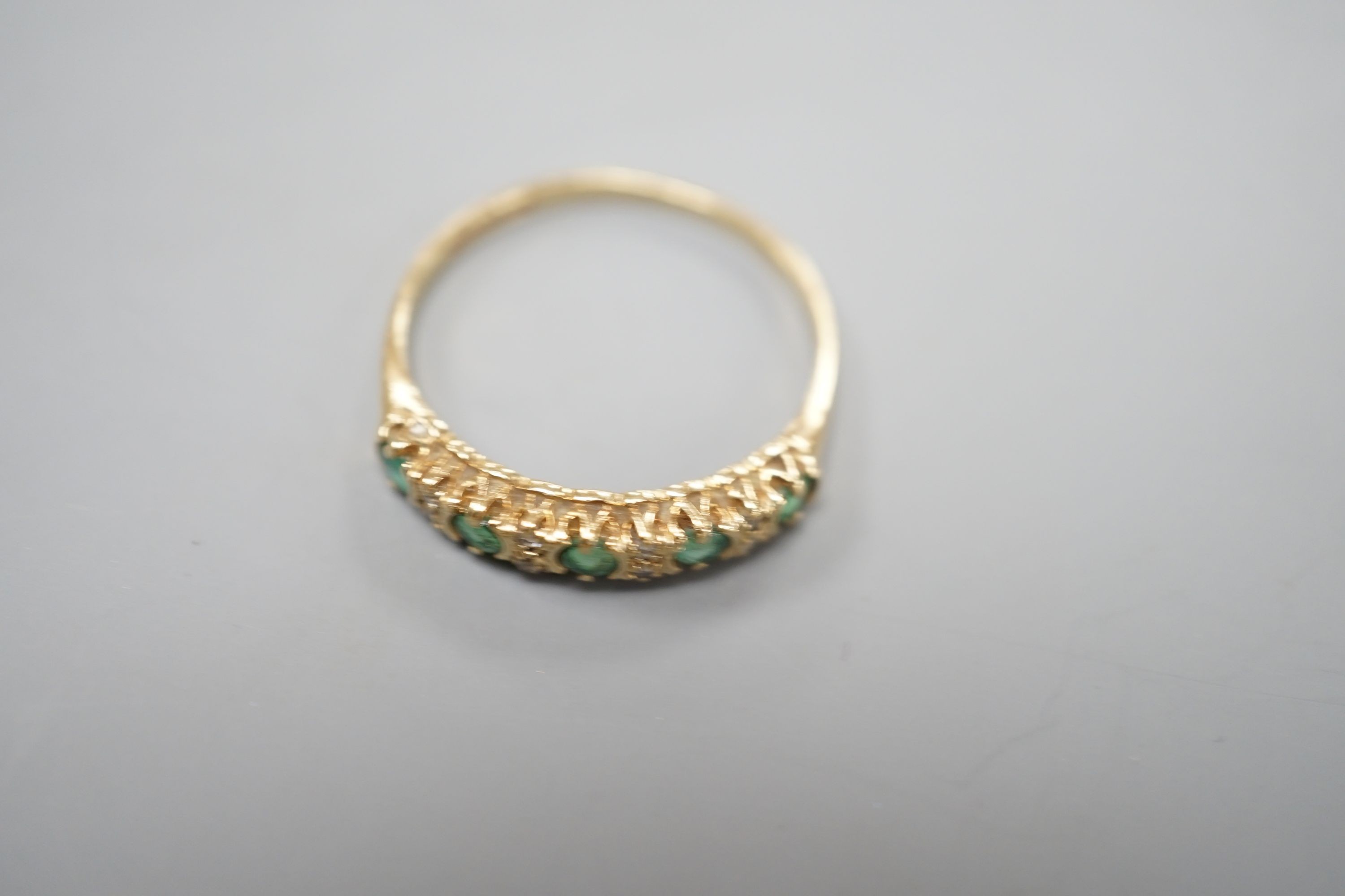 A 1962 gold sovereign, on 9ct bracelet with a 9ct gold gem set ring, gross weight 17.7 grams.